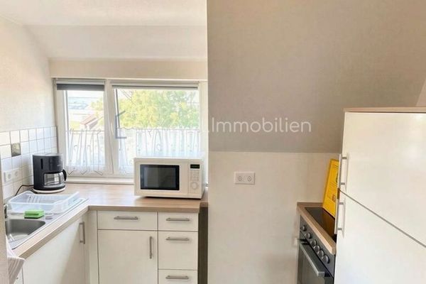 Kapitalanlage: 2-Zimmer-Dachgeschosswohnung mit Garage