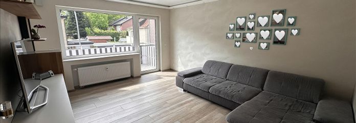 Appartamento di proprietà modernizzato con 4 locali, balcone esposto a sud, posto auto e grande cantina – Wohnzimmer