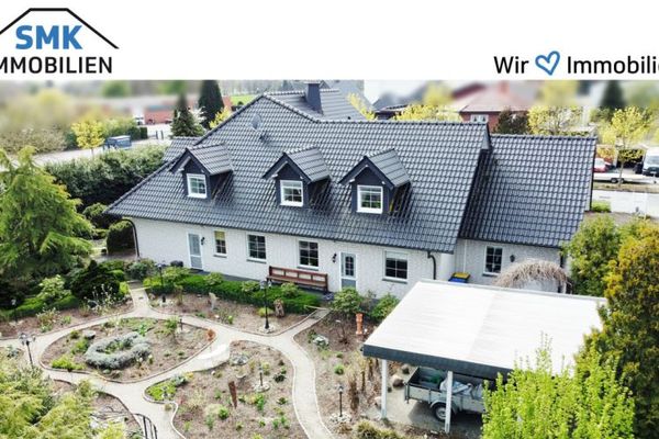Vivere e lavorare combinati alla perfezione – edificio residenziale con capannoni e uffici a Verl-Kaunitz!