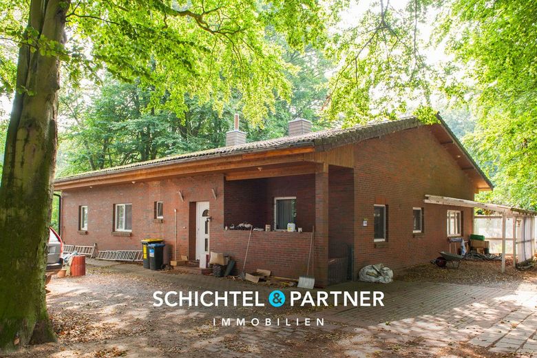 Farge | Solider Bungalow auf Waldgrundstück mit Doppelgarage – S&amp;P | Titelbild