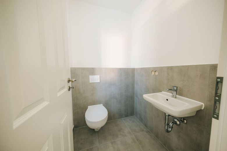 Sofort Bezugsfertig! Modernes Reihenendhaus mit Top-Ausstattung in Gallen – Gäste-WC