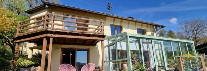 Lichtdurchflutetes Architektenhaus mit Panorama-Blick & Traumgarten in Heiligkreuzsteinach – Immobilie Gartensicht