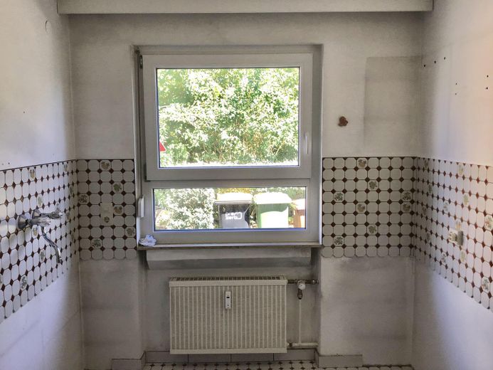 Affascinante casa a schiera in posizione tranquilla con garage – Küche Ost