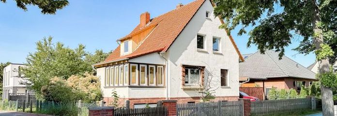 Zweiparteienhaus mit Entwicklungspotenzial – Eigennutzung, Vermietung oder Neubau