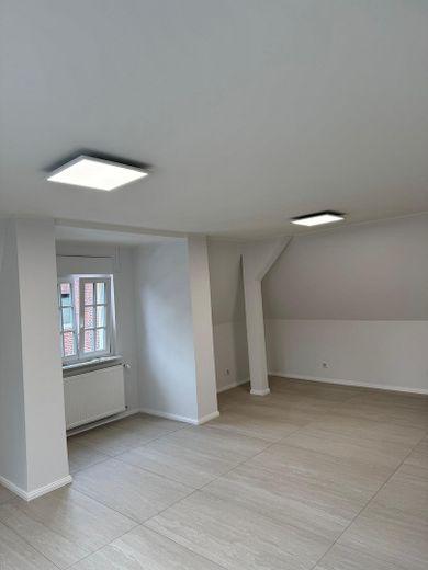 Beautiful 1-room apartment in the heart of downtown Ahaus – Wohn-/Schlafraum 