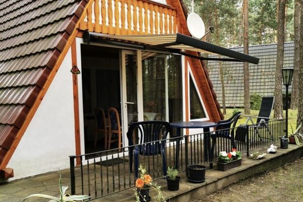 Красивый финский домик у Серебряного озера в Лозе