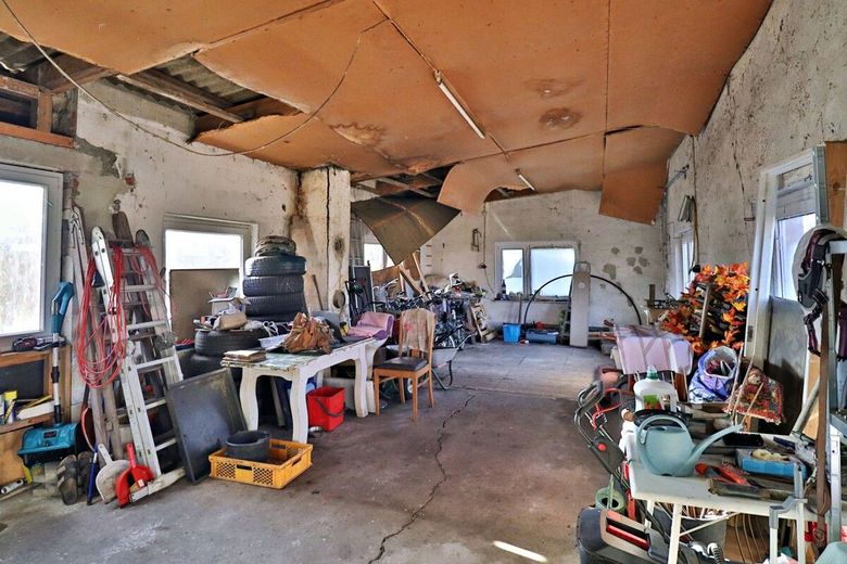 Mehrfamilienhaus mit Ausbaureserve in zentraler Lage von Lunden – Werkstatt