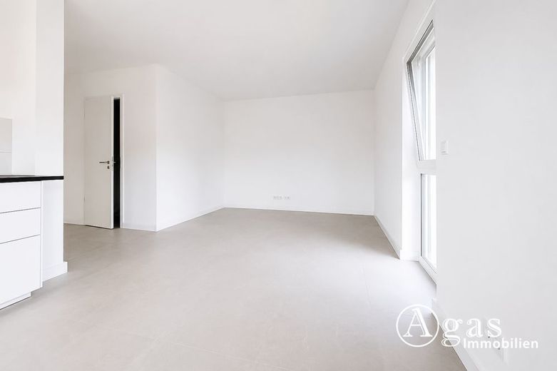 Eerste bewoning! Lichte 3-kamerwoning met zuidbalkon, EBK, lift en parkeerplaats voor auto – Wohnbereich