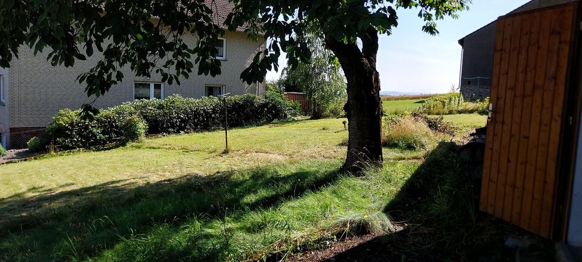 Casa unifamiliare con officina – spazio per vivere e creare – Garten