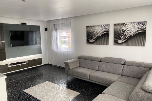 Appartement en copropriété luxueux avec balcon & garage + place de parking (au total 3 voitures) ainsi que chauffage au sol