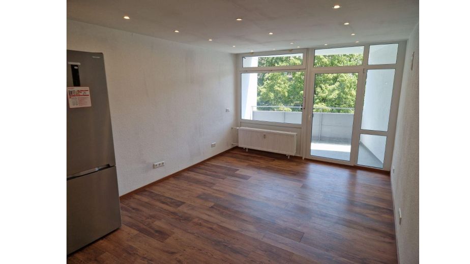 Wohnzimmer mit Küche