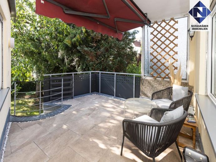 Wohnen mit Gartengefühl – gepflegte 4-Zimmer-Wohnung mit Terrasse in zentraler Lage – Foto 1