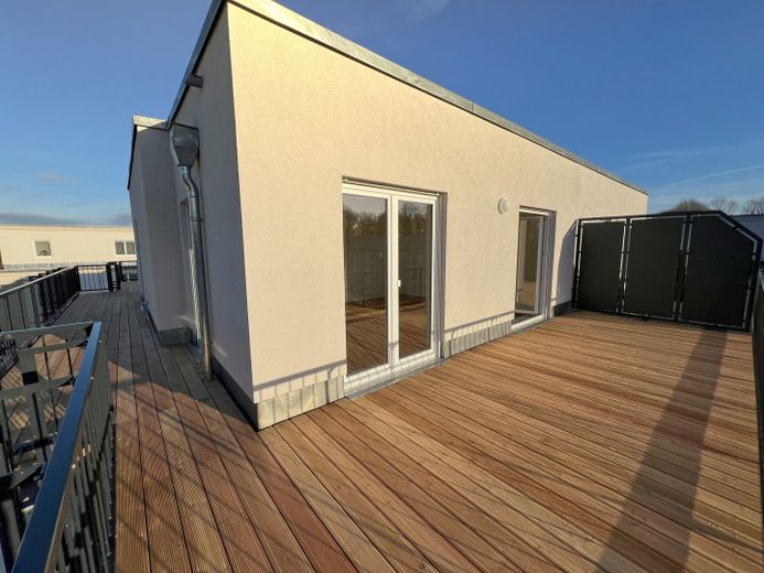 umlaufende 50qm Dachterrasse