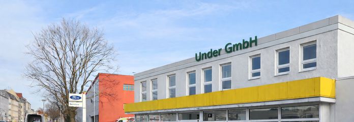 Car dealership with motor vehicle workshop & tire service TÜV in Berlin-Köpenick available for flexible rental – Frontansicht