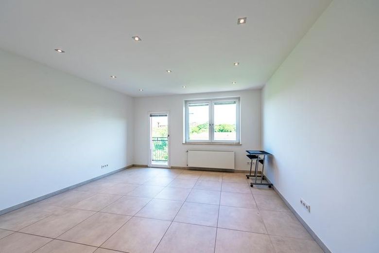 Wohnzimmer mit Balkon