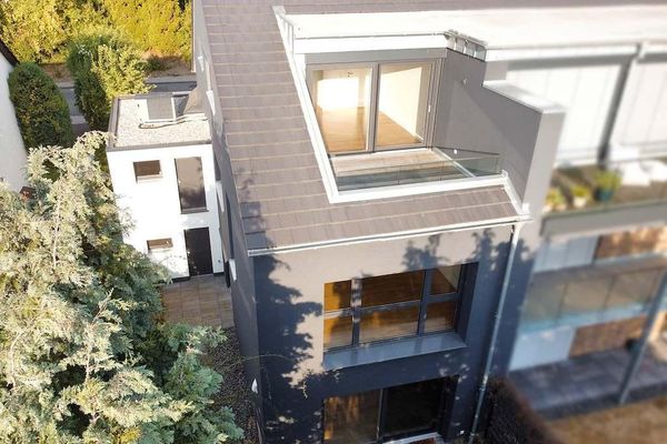 Attraktive Maisonettewohnung mit Haus-im-Haus-Charakter, Dachloggia, Garage