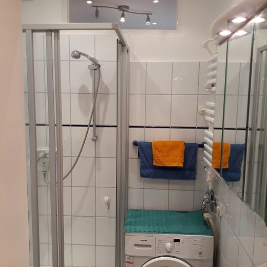 Duschbad mit Waschmaschine