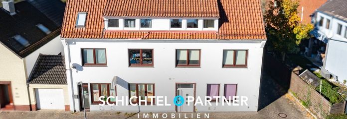 Vegesack | Mehrfamilienhaus mit Gewerbe, Garagen und großem Grundstück – S&amp;P | Titelbild