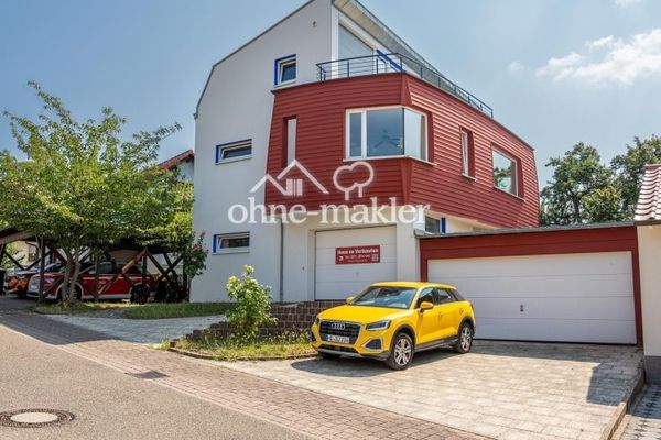 Wohnen mit Weitblick – Gepflegtes Zweifamilienhaus mit parkähnlichem Südgarten und Panoramablick