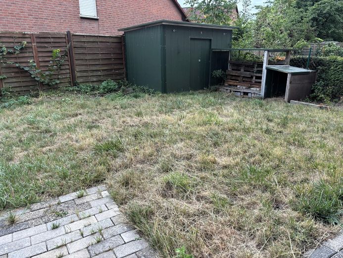 Helle 3-Zimmer-EG-Wohnung mit Terrasse und großem Garten – 48366 Laer – Gartenhütte