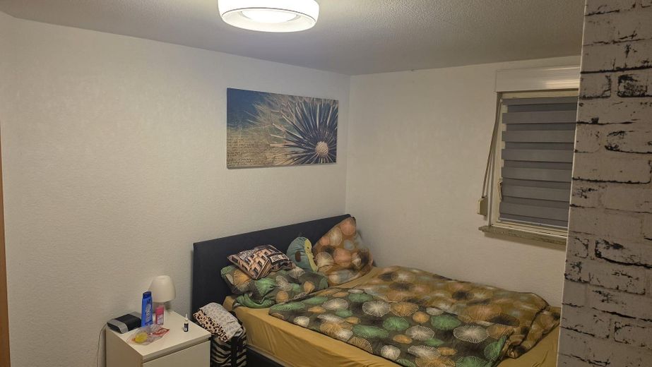 شقة سفلية - شقة مريحة من غرفتين بمدخل خاص ومساحة تخزين كافية – Schlafzimmer 1