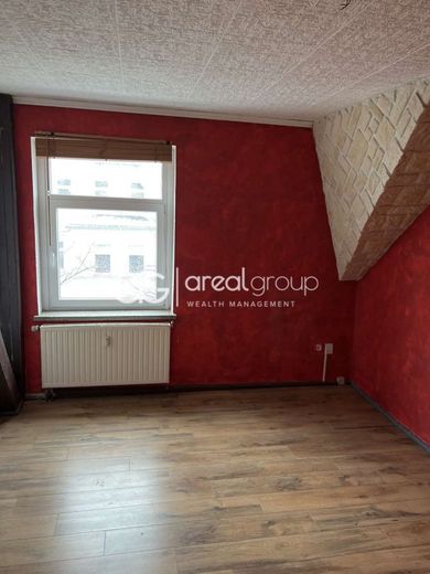 Helle DG-Wohnung mit Balkon und besonderem Flair – Schlafzimmer
