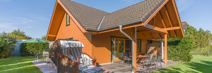 Wymarzony dom drewniany z sauną i dużym tarasem na narożnej działce o powierzchni 931 m², niedaleko St. Peter-Ording – Gartenansicht