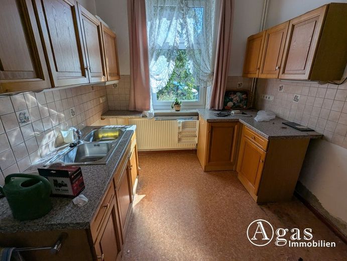Schmuckstück im Dornröschenschlaf: Einfamilienhaus mit Einliegerwohnung + Nebengelass in Biesenthal – Küche Einliegerwohnung