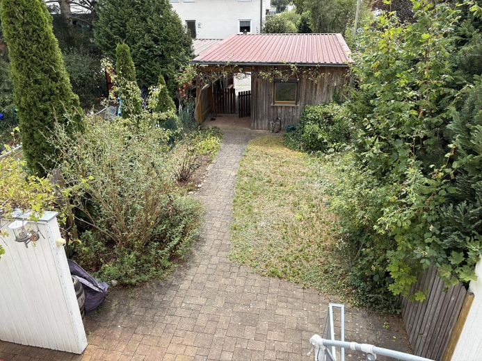 Zuhause fühlen in Reihenmittelhaus in ruhiger, familiärer Lage – Garten mit Carport
