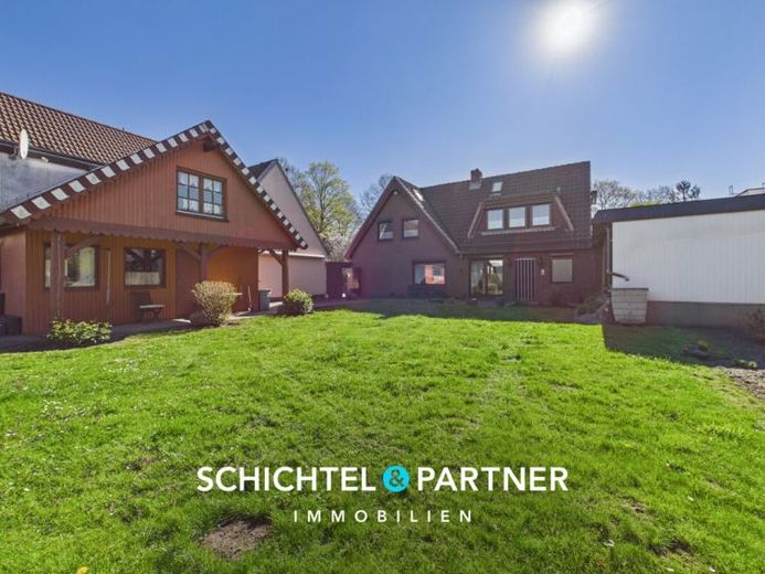 Woltmershausen | Familienhaus mit Carport & großem Südwest-Garten – Foto 1