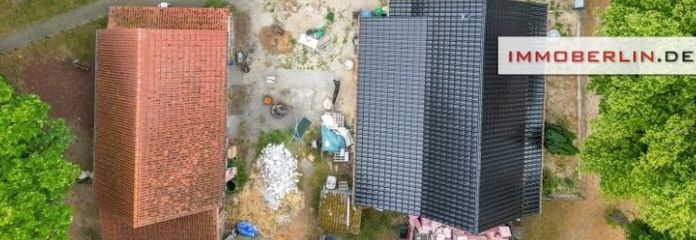 IMMOBERLIN.DE - Terreno esposto a sud-ovest con due case e garage in posizione adatta alle famiglie