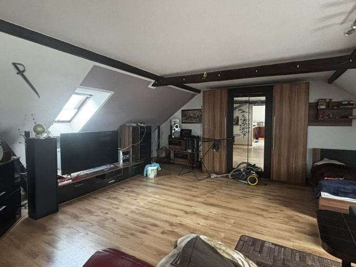 Kompakte, langfristig vermietete Dachgeschoss-Eigentumswohnung – eine überschaubare Kapitalanlage mit bestehendem Mietverhältnis – Foto 1