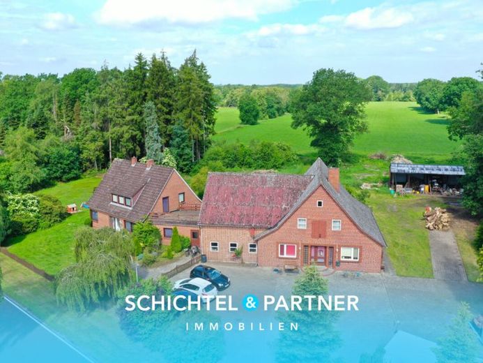 Giehlermoor | Zwei vermietete Einfamilienhäuser und ein Baugrundstück – फोटो 1