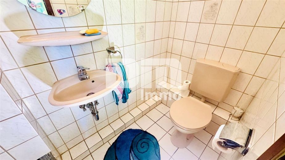 Charmantes Wohnglück - Ihr neues Zuhause mit Carport / Terrasse und großem Gartenbereich – EG Gäste WC