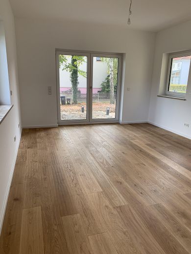 Wohnzimmer mit Parkett