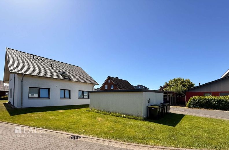 Hell. Offen. Energieeffizient. KfW-40-Wohnung mit sonniger Terrasse und Garage – Außenansicht - Bild 5