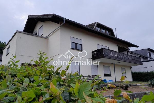 Commission-free from private seller: Spacious apartment building with expansion potential and dream view