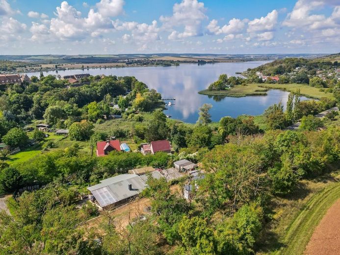 Traumgrundstück in Seeburg - genehmigte Bauvoranfrage für Wohnbebauung &amp; unverbaubarer Seeblick! – Außenaufnahme