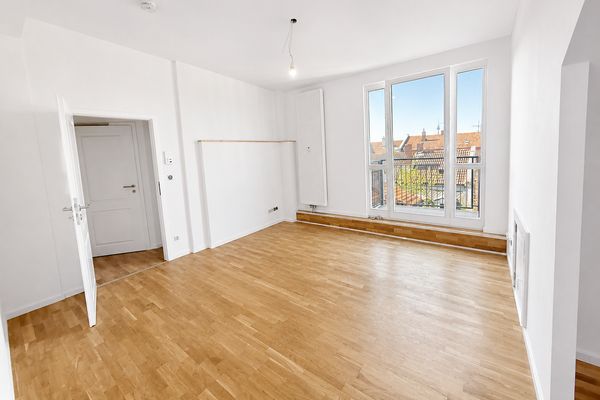 Primo utilizzo dopo l'ampliamento del sottotetto: luminoso appartamento di 2 locali con cucina componibile e balcone