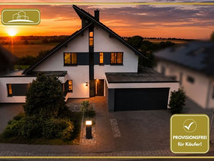 KfW-55-Familienhaus mit Loxone Smart Home, PV-Speicher und freiem Blick – Foto 1