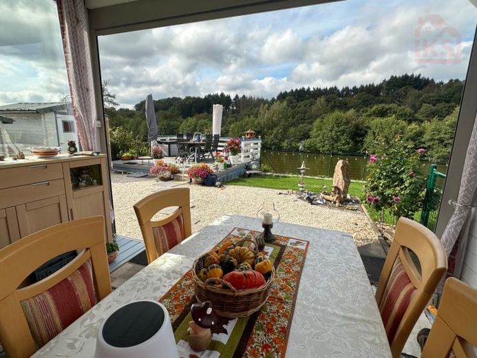 Wo der Blick zur Ruhe kommt – Ihr Zuhause direkt am Schwarzrindersee mit Seezugang – Foto 1