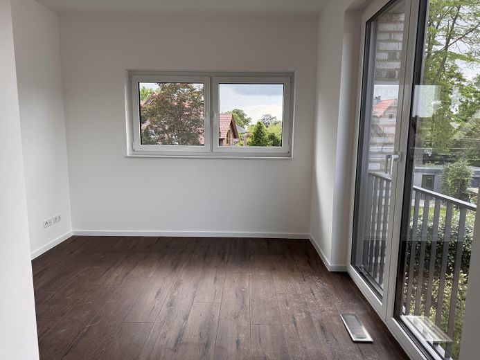 Großzügige helle Neubauwohnung im 1.OG eines Zweiparteienhaus in Verl – 2. Kinderzimmer/Büro 