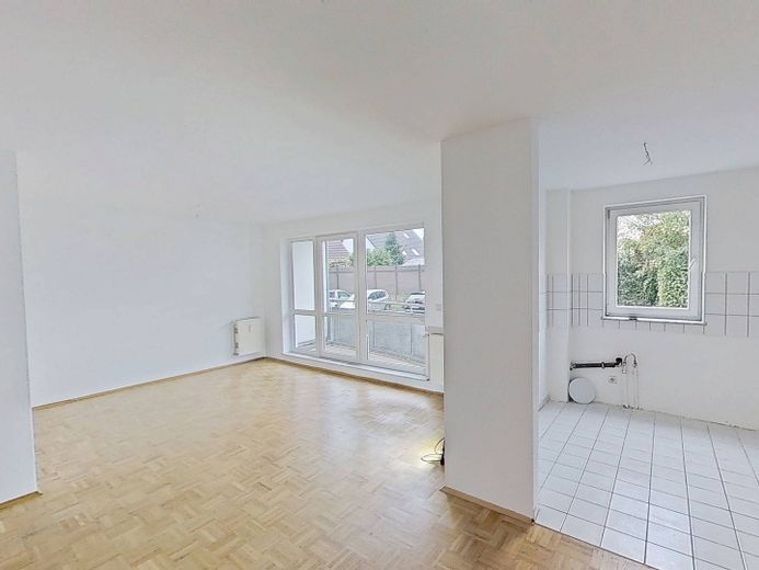 Moderne 3-Zimmer-Wohnung im Wohnpark Biestow – Ansicht II: Wohnzimmer mit Zu…