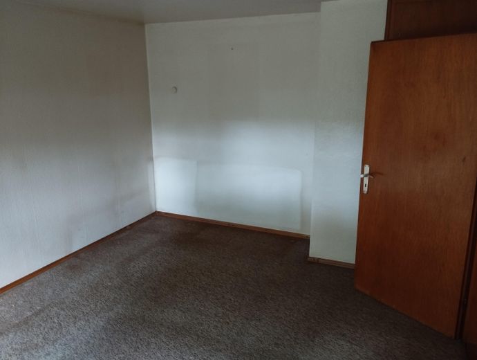 End-of-terrace house, 80m² of living space, for sale in a traffic-calmed area of Albersbösch, Offenburg – Wohnzimmer