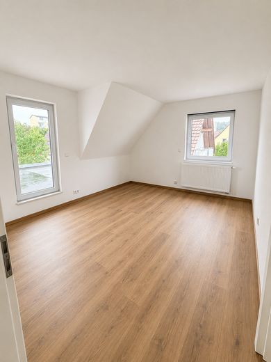 Sanierte ein Familienhaus – Zimmer 1 DG