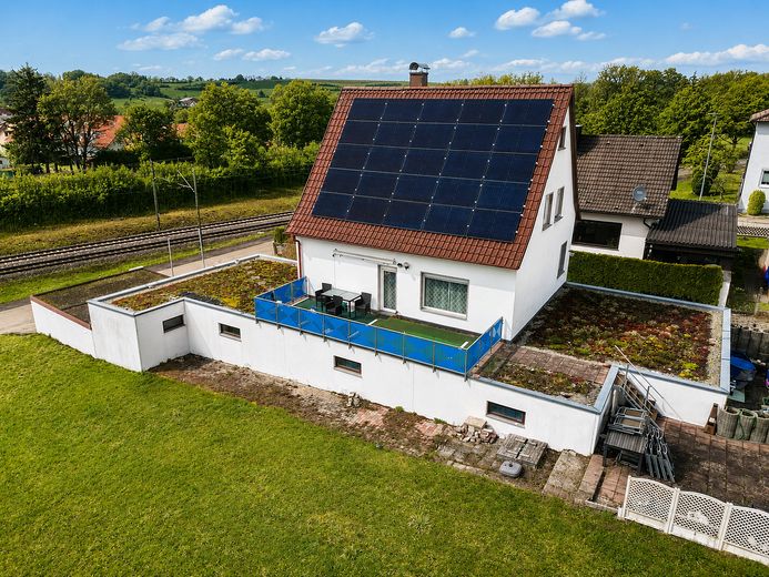 Provisionsfrei: 125 m² Wohnen + ca. 130 m² Gewerbe | Energieklasse A | 1.085 m² Grundstück – Süd Ansicht