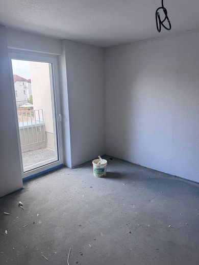 Schlafzimmer mit Balkontür