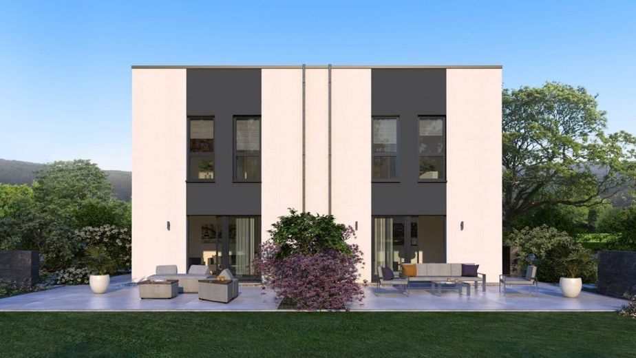 MODERNE ARCHITEKTUR TRIFFT AUF GEMÜTLICHKEIT – Ansicht Garten
