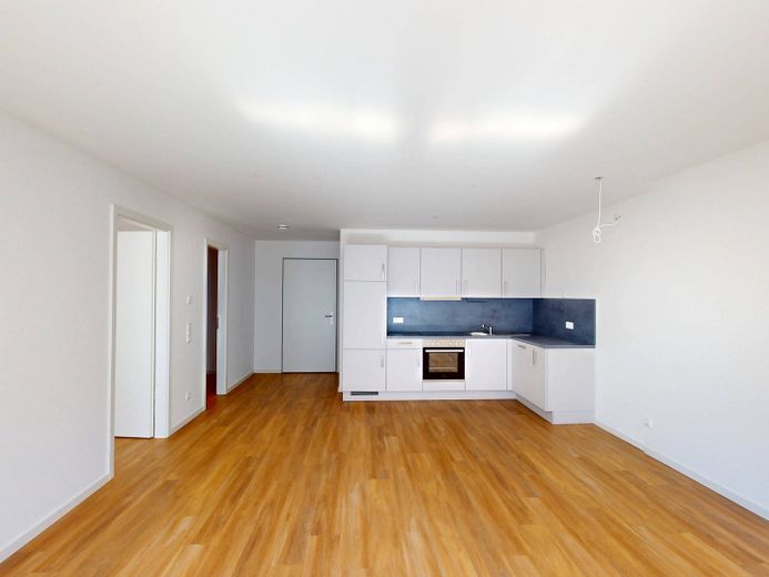 Helle 2-Zi.-Neubauwohnung mit EBK, BALKON, Fußbodenheizung uvm. – Ansicht III: Wohn- und Esszim…
