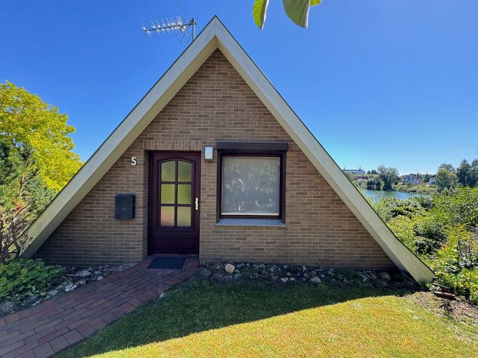 Einfamilienhaus am See mit ELW, Schlossblick und Steg, provisionsfrei – Foto 8